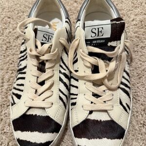 Sam Edelman Women's Aubrie Sneakers in a zebra print cowhair finish.